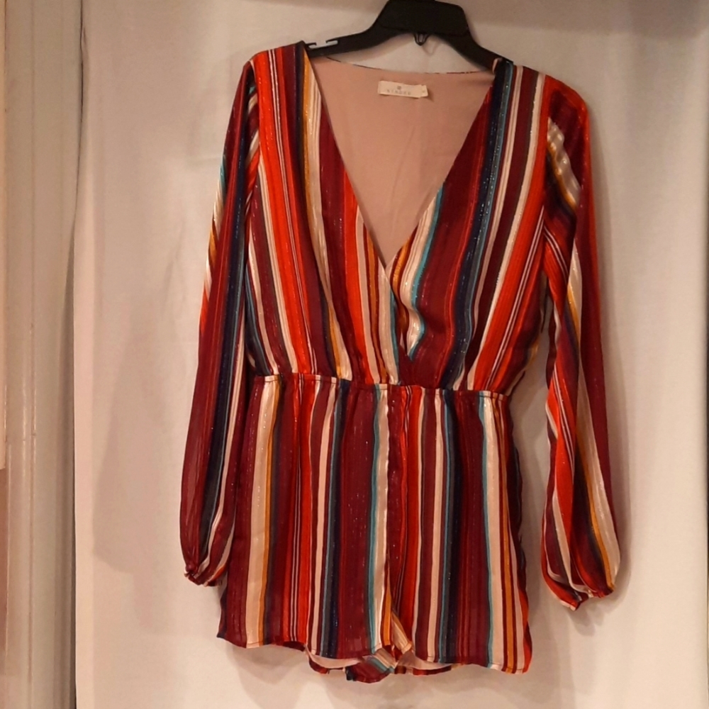 Striped jumpsuit with metallic thred throughout size M